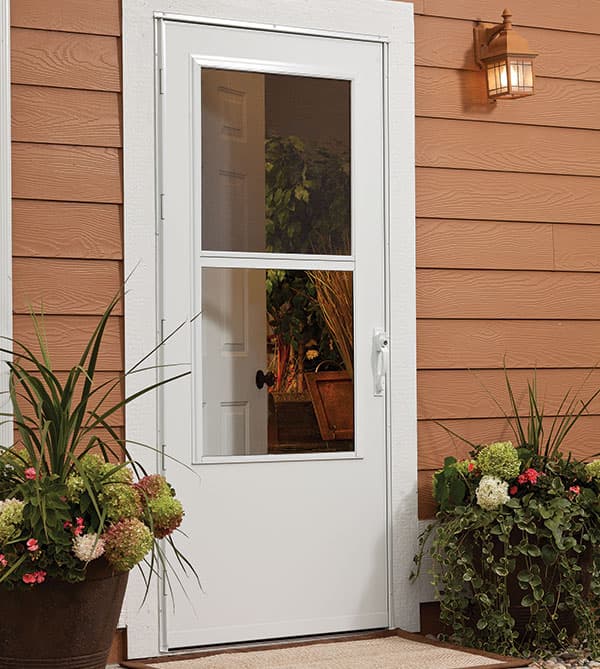 A Larson storm door being showcased on the outside of a home.