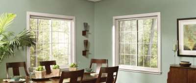 Gentek Concord Windows being showcased inside of a beautiful dining room.