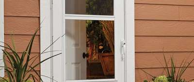 A Larson storm door being showcased on the outside of a home.